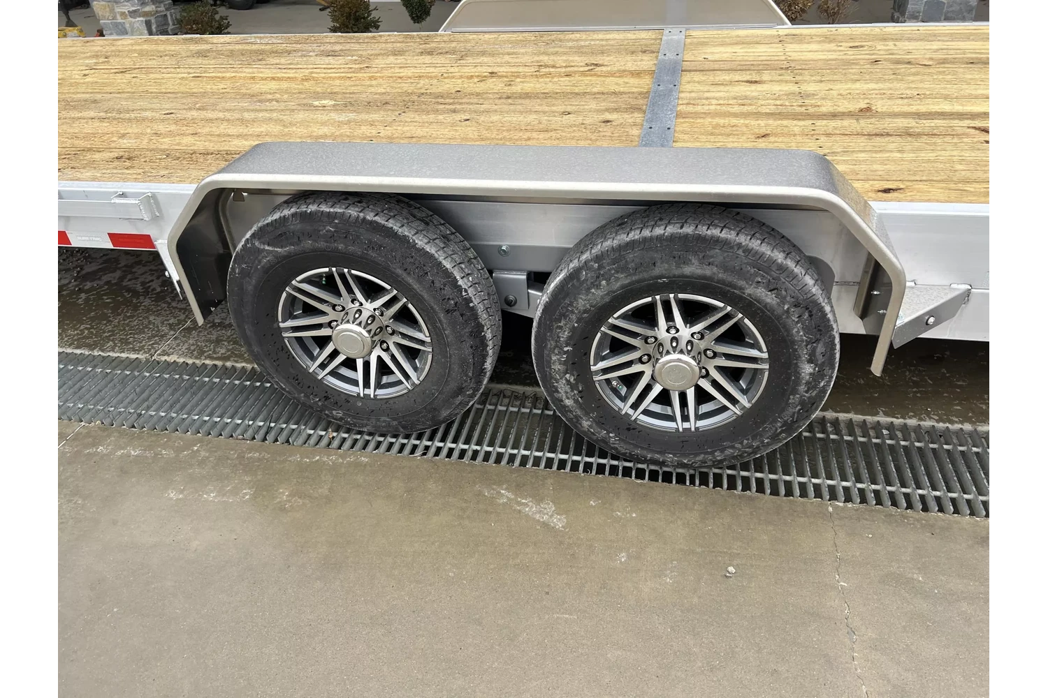2026 Sure-Trac 7x22 14000# Aluminum Tilt Trailer - wheel and axle detail 2