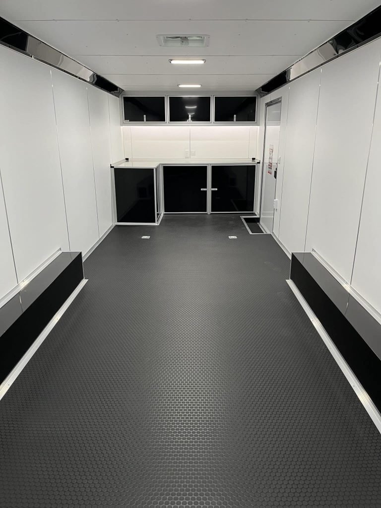 Enclosed Car Hauler 2026 28ft. Extreme w/6K Torsion Spread Axles, Finished Interior w/Cabinets & Alum. Wheels 0592